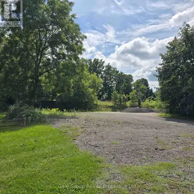 Empty lot for lease. Graded and flat. Good for many uses. Just over 1/3 of an acre. Gravel. (id:2449...