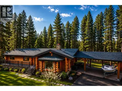 Welcome to 5007 Canium Court, a stunning luxury log home tucked at the end of a quiet cul-de-sac in...