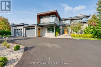 Absolutely breathtaking modern estate on 2 acres! Meticulous maintained stone, stucco and cedar exte...