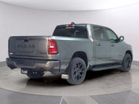 The 2025 Ram 1500 Sport 4x4 Crew Cab in an attractive gray is an impressive blend of power and luxur... (image 4)