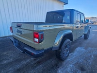 For a quick response please text 403-820-9940. AMVIC licensed business The 2026 Jeep Gladiator Sport... (image 4)
