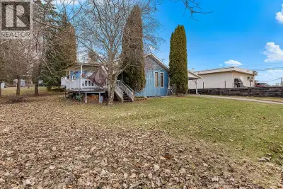 3 bedroom, 2 bathroom home on 0.51 acre PLUS commercial building with option to purchase existing bu...