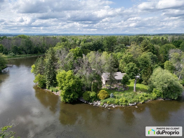 $950,000 - Bungalow for sale in St-Andre-D'Argenteuil — photo 1