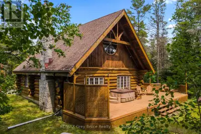 Turn-Key & Fully Furnished! Experience true cottage living with this charming waterfront log home on...