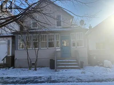 Live on the main floor and basement and rent out the one bedroom upstairs apartment to help with the...