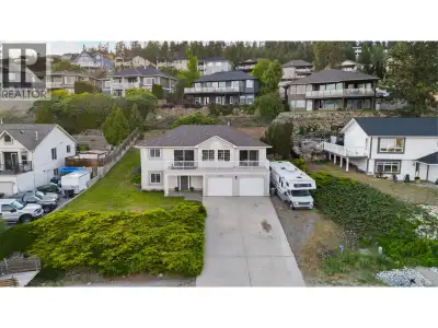 Shannon Lake value alert! This 4-bed, 2-bath home sits on a generous 0.21-acre lot in one of West Ke...