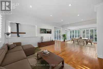Welcome to this beautifully updated bungalow nestled on a private 100' x 162' manicured, tree-lined...