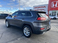 The 2016 Jeep Cherokee Limited in stunning Granite Crystal Metallic arrives equipped to elevate ever... (image 6)