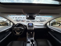 The NX 200t is characterized by its aggressive "spindle" grille and sharp, angular body lines. As th... (image 7)