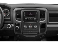 The 2022 Ram 1500 Classic Tradesman 4x4 Crew Cab, adorned in a striking black exterior, is built to... (image 6)