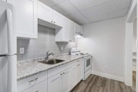 Amenities: Heat & Water Included • Large Windows • Quiet Building Suite & Building: Spacious bachelo... (image 6)