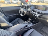 The Lexus UX 250h is built for drivers who want premium efficiency without giving up comfort or styl... (image 9)