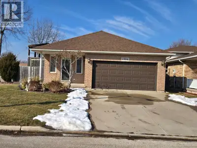 RAISED RANCH IN DEVONSHIRE HEIGHTS, THIS HOME FEATURES A LARGE OPEN CONCEPT LIVING AND KITCHEN AREA...