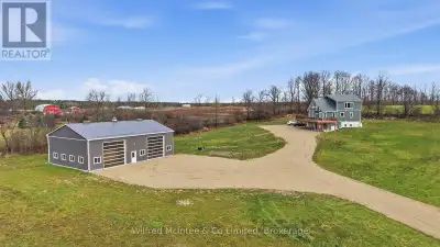 Custom built in 2023, this 2400sqft, 40x60 insulated shop is equipped with 16' ceilings, two oversiz...