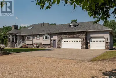 Welcome to your dream acreage, where style, class, and privacy come together. This rare and remarkab...