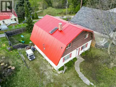 Nestled opposite Riondel Golf Course and the lake, this custom-built home offers captivating views o...