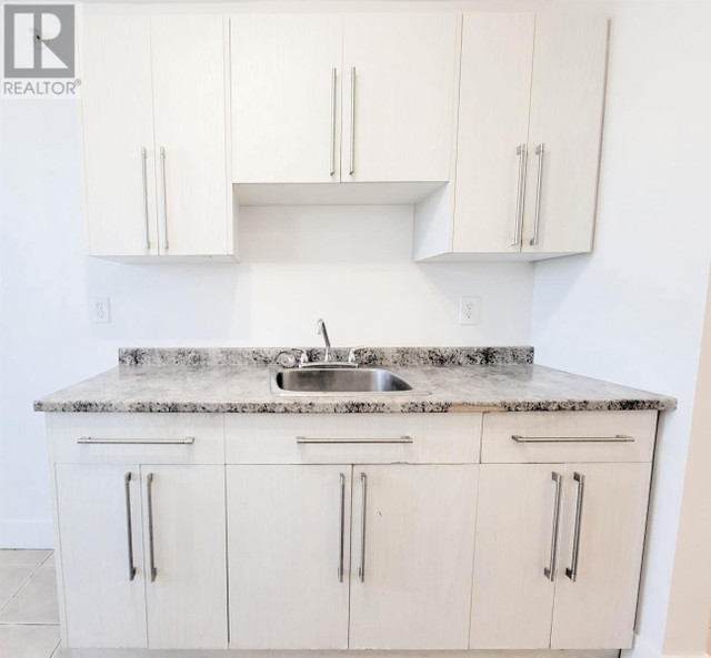 305 1501 QUEENSWAY STREET Prince British Columbia Condos for