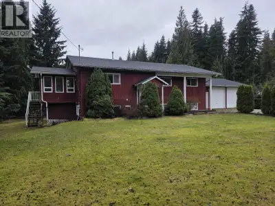 Lakelse Lake acreage living!!! Spacious 5 bedroom 3 bathroom home situated on 2.4 acres just 1 block...