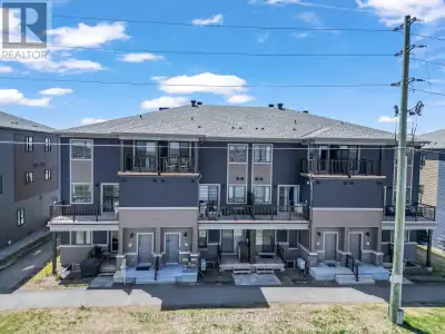 Welcome to 416 Parnian Private. This beautifully designed 3-bedroom, 2-bath stacked townhome offerin...