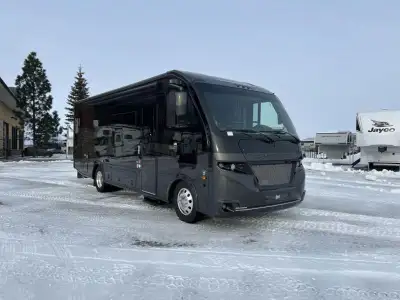 Coachmen Euro Class A gas motorhome 25TB highlights: Spacious Full Bath Induction Cooktop Recliners/...