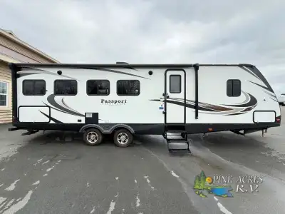 Keystone Passport 2900RK Grand Touring travel trailer highlights: Rear Kitchen Two Chairs U-Shaped D...