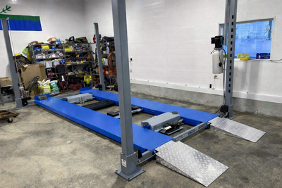 IN STOCK – READY FOR PICKUP OR DELIVERY 11,000LB X-WIDE 4-POST LIFT – BUILT FOR TRUCKS, DUALLYS & MO...