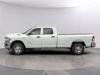 The 2021 Ram 3500 Tradesman, proudly presented in a pristine White finish, is a powerhouse of capabi... (image 2)