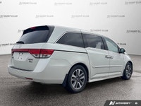 Simplify family journeys with the 2016 Honda Odyssey Touring. This white minivan, with 157,038 kilom... (image 6)