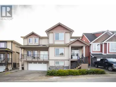 Beautiful family home with stunning mountain views! This home features a huge gourmet kitchen with a...