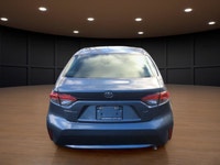 The 2021 Toyota Corolla LE in sleek gray with its reliable front-wheel drive and automatic transmiss... (image 6)