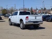 This pre-owned 2022 Ram 2500 Big Horn Crew Cab offers a clean and commanding look with its Bright Wh... (image 3)