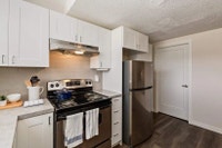 Amenities: Renovated Suites • Playground • Green Space • In-Suite Laundry Suite & Building: Two-bedr... (image 5)