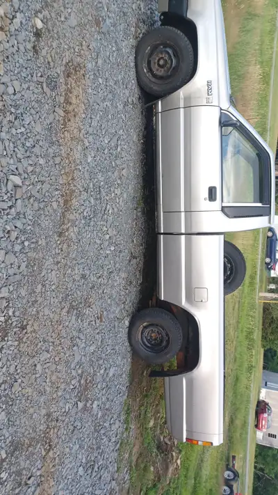 89 dodge d50 2wd. Truck is super solid. Needs brake line . And a ignition coil. Has lost spark. Fram...