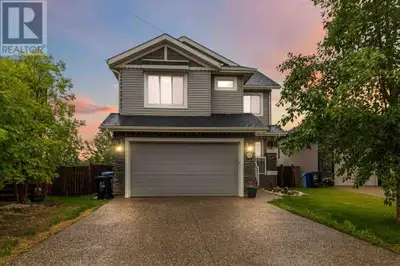 SPACIOUS 2-STOREY HOME WITH JUST UNDER 3000 SQ FT OF LIVING SPACE, 5 BEDROOMS, 4 BATHROOMS, BACKING...