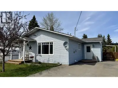 Easy one-level living with space where it counts! This 2-bedroom, 1.5-bath home features a generous...