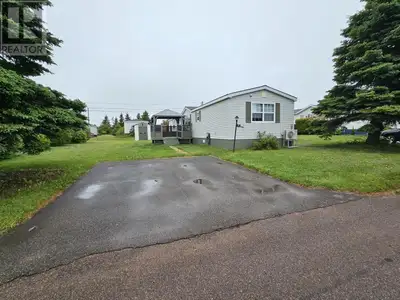 Here is a very nice, well-kept, 3 bedroom, 1 bath, mini home in Woodridge Park. 10x12 shed built in...