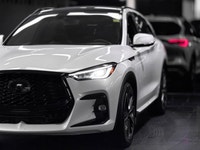 The 2023 INFINITI QX50 Sport is the boldest expression of the QX50 lineup, trading traditional chrom... (image 2)