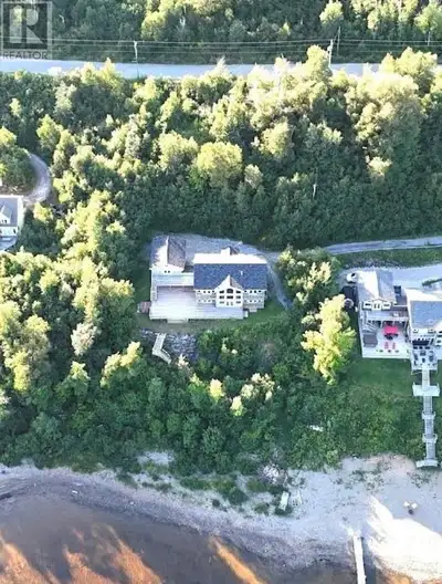 48 Lakeside Drive is located on the waterfront just minutes from the bridge at Humber Valley Resort....