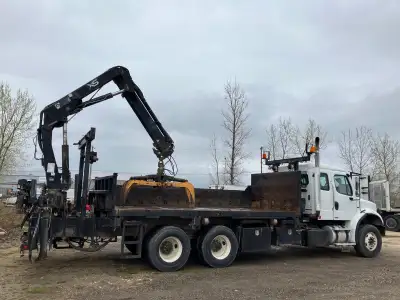 2006 Freightliner M2 with Hiab 144 CLX with remote control. If you do not need the grapple sell it....