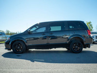 The 2019 Dodge Grand Caravan SXT with wheelchair conversion offers accessible mobility with reliable... (image 4)