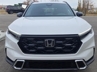 WE DELIVER ANYWHERE IN CANADA! The 2026 Honda CR-V Hybrid Touring is the ultimate blend of modern ef... (image 1)