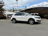 The 2016 MKX Reserve is characterized by its "Split-wing" front grille and a full-width LED taillamp... (image 1)