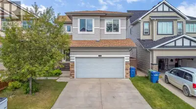 WALKOUT LOT, BRAND NEW ROOF. Welcome to this stunning family home nestled in one of Airdrie’s most s...