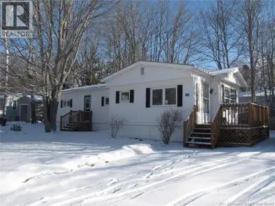 Beautiful 2 bedroom mini home sitting on corner lot with large baby barn with electric, home has lot...