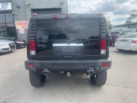 All vehicles come with a full vehicle History Report, ask to see it! 2006 Hummer H2. AWD, Air condit... (image 6)