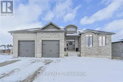 Welcome to this thoughtfully crafted to-be-built 1,500 sq. ft. bungalow set on a desirable 50' x 120...