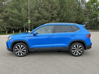 // ACCIDENT FREE!! // Finished in Blue with a Black interior, this 2023 Volkswagen Taos Comfortline... (image 9)