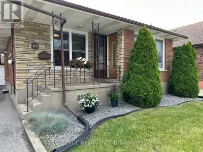 This charming brick bungalow is in the perfect location! It's close to the QEW, schools, shopping an...