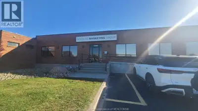 2,100 SF of nicely finished offices consisting of 6 offices, lunchroom and a separate front Walker f...