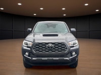 The 2023 Toyota Tacoma TRD Sport V6 in stunning gray is ready to tackle any terrain with its robust... (image 2)